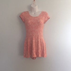 Pink and white patterned romper